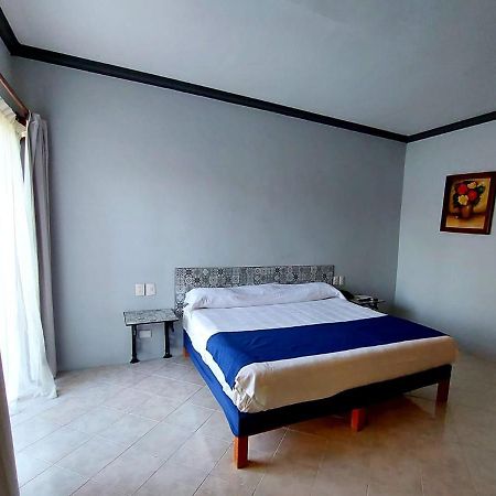 グラン ホテル アシエンダ デ ラ ノリア アグアスカリエンテス エクステリア 写真 A bedroom at the hotel