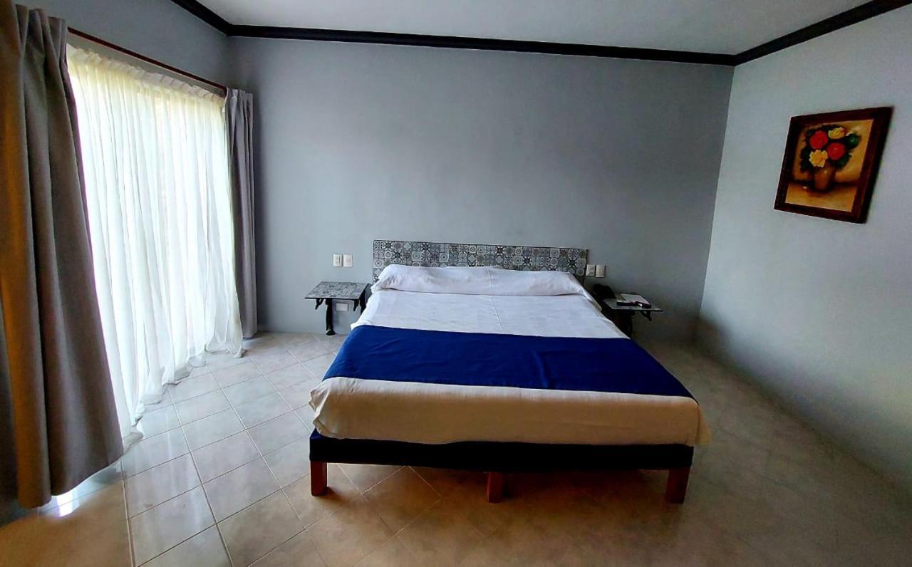 グラン ホテル アシエンダ デ ラ ノリア アグアスカリエンテス エクステリア 写真 A bedroom at the hotel