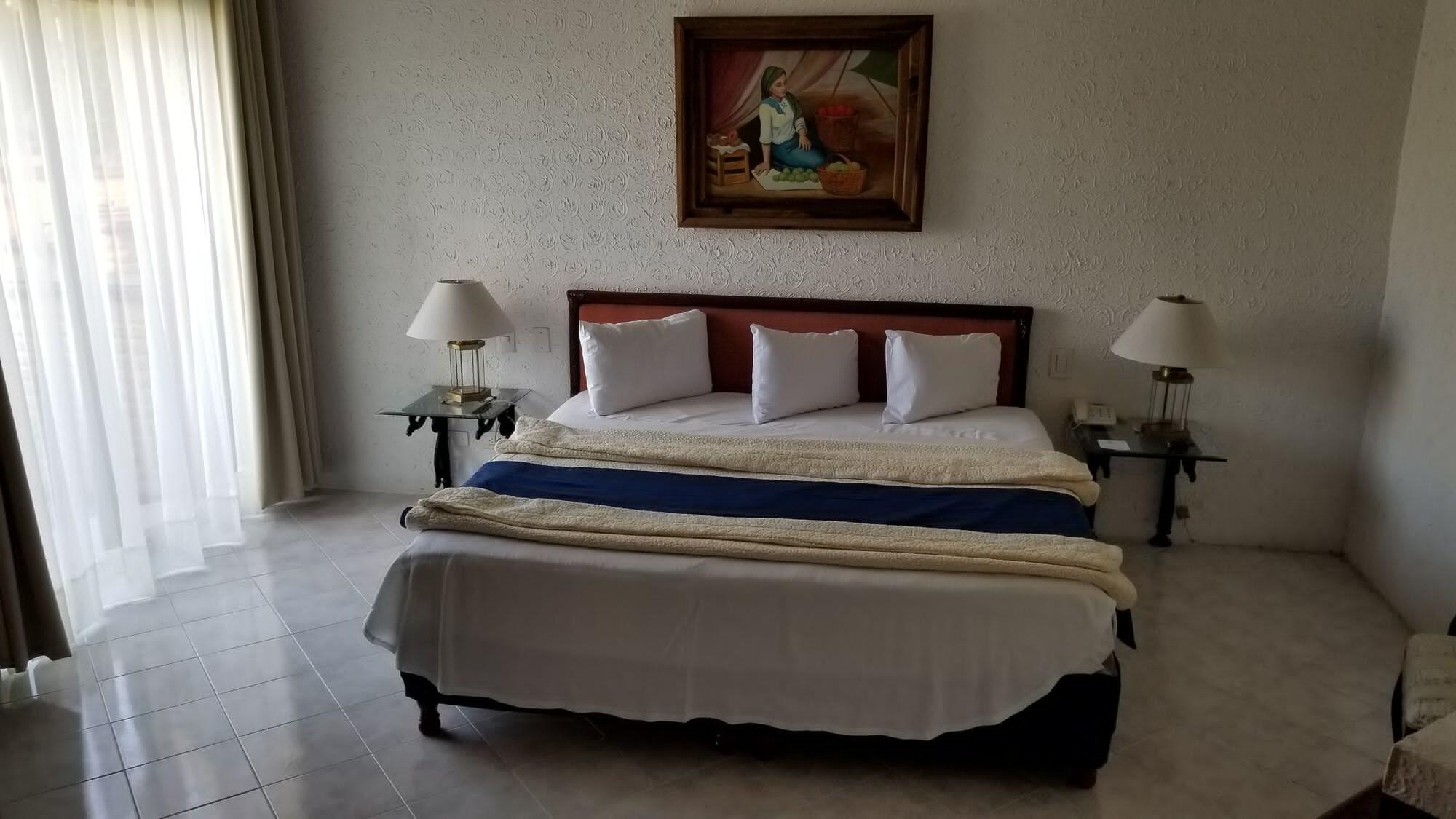 グラン ホテル アシエンダ デ ラ ノリア アグアスカリエンテス エクステリア 写真 A bedroom at the hotel