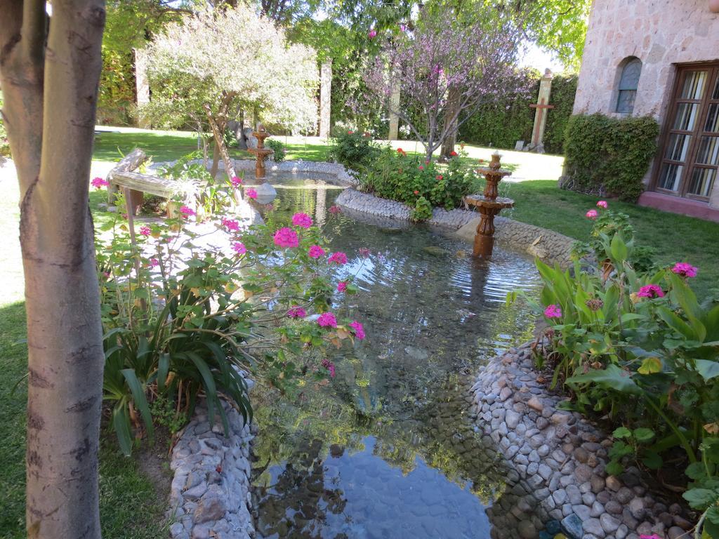 グラン ホテル アシエンダ デ ラ ノリア アグアスカリエンテス エクステリア 写真 The gardens at the center